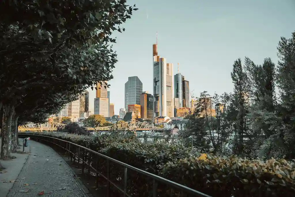 An aerial view of a dense city with tall buildings and streets below.